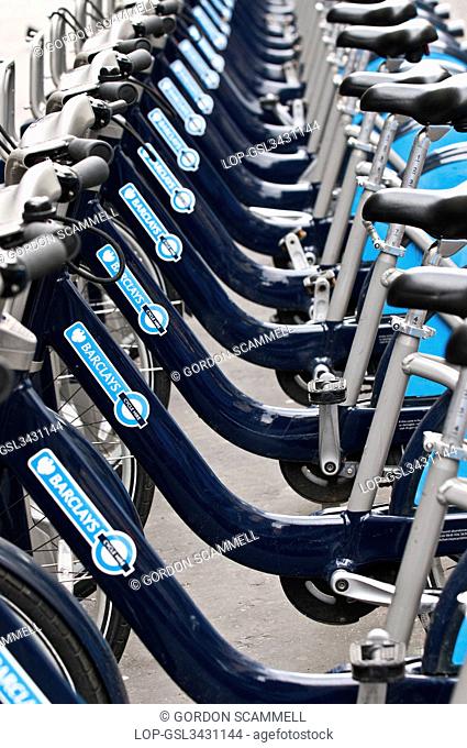 England, London. A row of Barclays Cycle Hire scheme bikes in a docking station