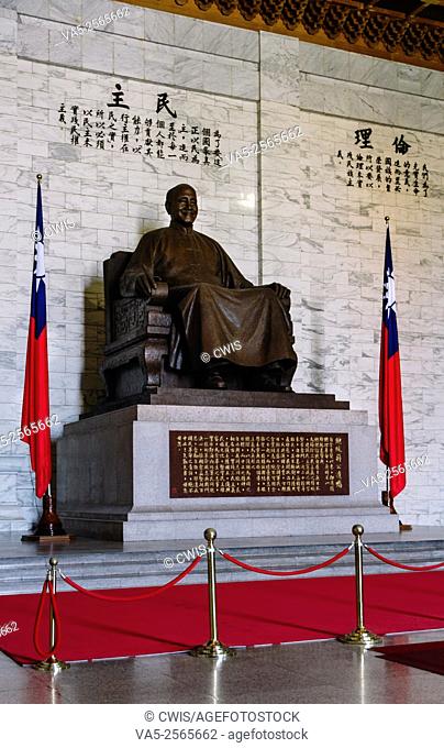 Taipei, Taiwan - The Statue of Chiang-Kai-Shek and the flag of Republic of China in the CKS Memorial Hall