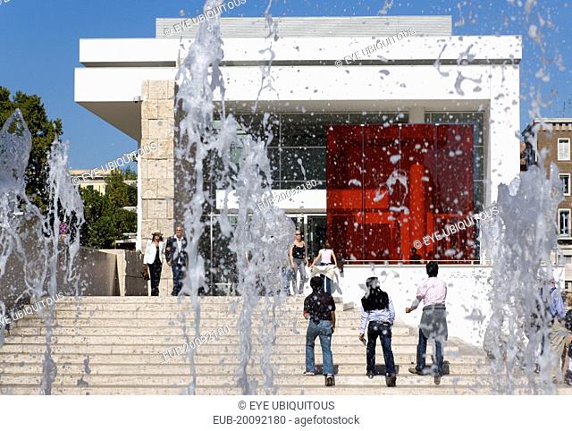 The fountain and steps with sightseers leading to the building hosuing the Ara Pacis or Altar of Peace built by Emperor Augustus to celebrate peace in the...