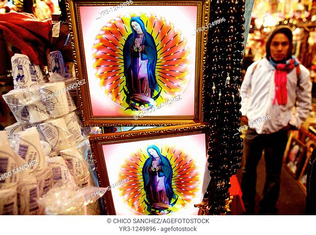 Souvenirs hang for sale outside the Basilica of Guadalupe in Mexico City. Hundreds of thousands of Mexican pilgrims converged on the Basilica