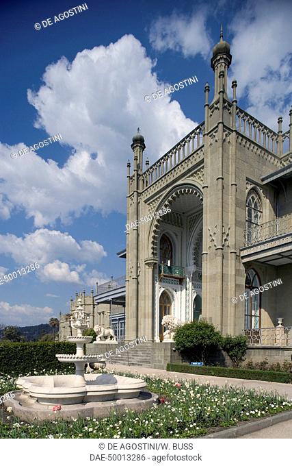 View of the neo-Moorish style southern facade of Vorontsov Palace, 1828-1846, designed by Edward Blore (1789-1879) with the Ay-Petri peak (1234 m) in the...