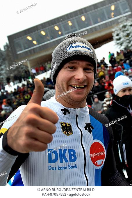The German bobsleigher Johannes Lochner celebrating the win after the second run in the men's four event at the Bobsleighing World Cup in the in the DBK ice...