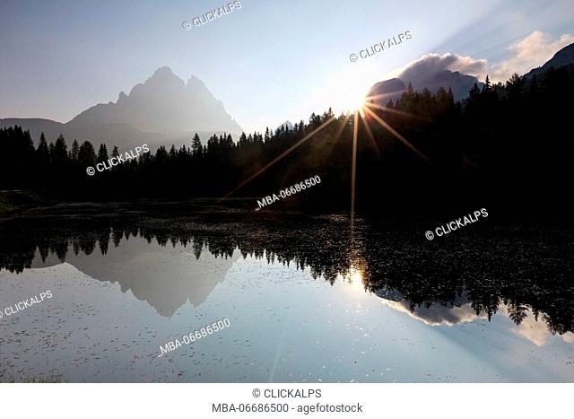The Three Peaks of Lavaredo are reflected in Lake Antorno at sunrise. Veneto Sesto Dolomites Italy Europe