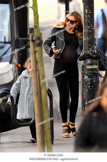 Pregnant Abbey Clancy and her daughter Sophia out with a friend in Hampstead Featuring: Abbey Clancy, Sophia Ruby Where: London