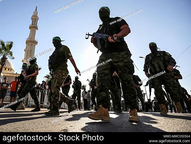 Armed men from the Izz al-Din al-Qassam Brigades, the military wing of Hamas, participate in a military parade in Gaza City. Palestine