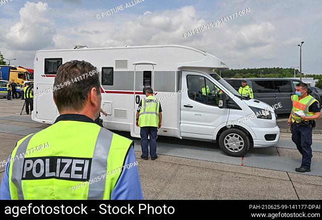 25 June 2021, Brandenburg, Linthe: During a police check focusing on motorhomes and caravans, a motorhome is checked by police at the Fläming Ost rest area on...