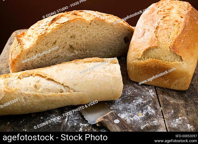 White tin loaf, baguette and farmhouse bread