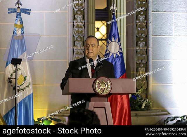 31 March 2023, Guatemala, Guatemala-Stadt: Alejandro Giammattei, President of Guatemala, attends a press conference with the President of Taiwan at the National...