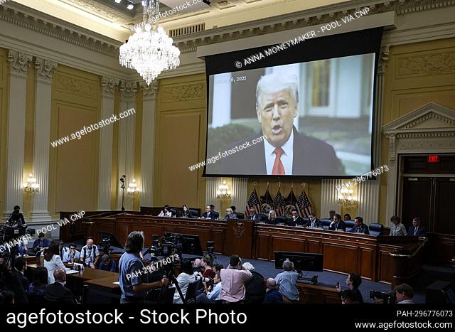 WASHINGTON, DC - JUNE 28: A video of former President Donald Trump is played as Cassidy Hutchinson, a top former aide to Trump White House Chief of Staff Mark...