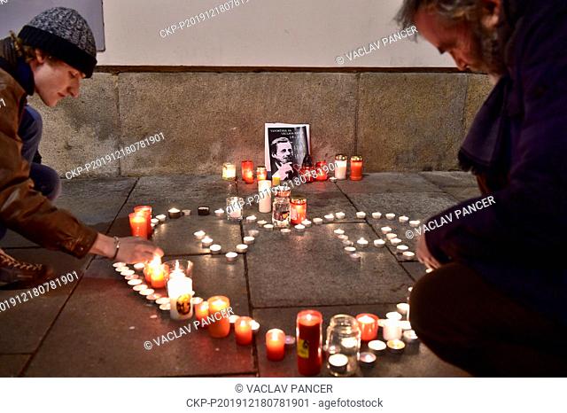 People light candles for Vaclav Havel in Ceske Budejovice, Czech Republic, on the eighth anniversary of his death on December 18, 2019