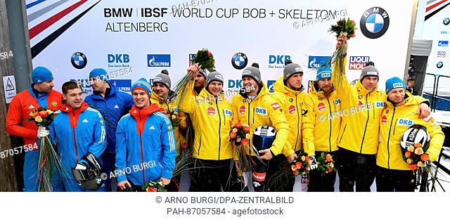 The Russian bobsleighers (l-r) Maxim Belugin, Aleksei Pushkarev, Alexander Kasjanov, Alexey Zaitsev (second place), the Germans Christian Rasp, Joshua Bluhm