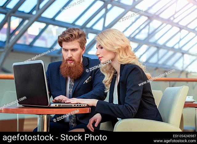 business couple working together on project at modern office