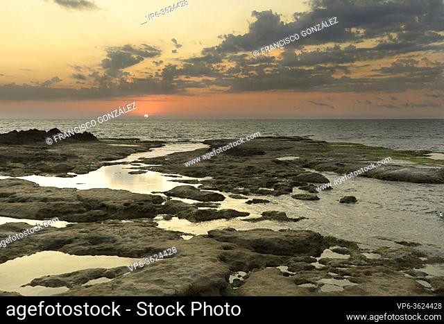 Sunrise at Cabo Cervera in Torrevieja, Alicante province in Spain. Horizontal shot with space for text