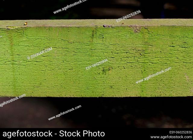 Plain green rough textured wood background with space for copy. High quality photo