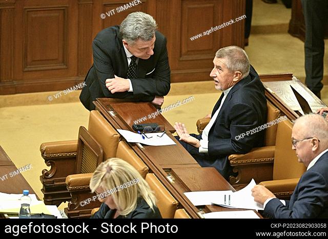 Former Czech Prime Minister and leader ANO movement Andrej Babis (centre right) speaks with Czech justice minister Pavel Blazek (centre left) during session of...