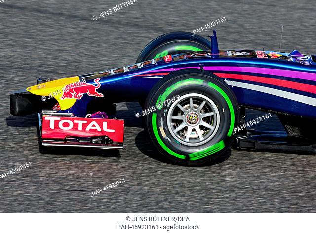 German Formula One driver Sebastian Vettel of Red Bull steers the new RB10 during the training session for the upcoming Formula One season at the Jerez...
