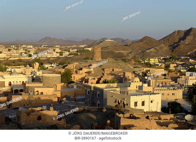 Houses and old watch tower at the edge of the Wahiba Sands desert, Al Mudayrib, Ash Sharqiyah, Oman