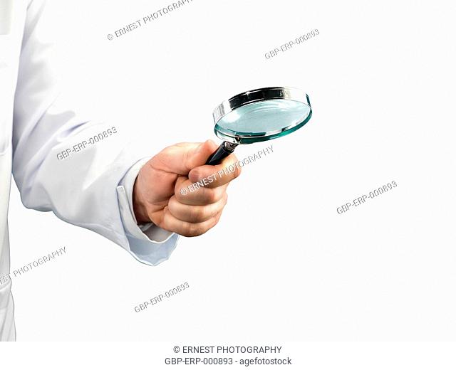 Person, hand, magnifying glass