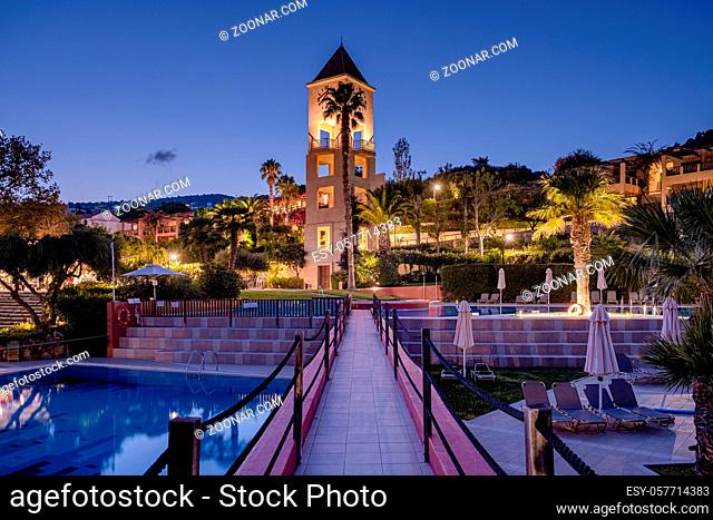 Crete Greece, Candia park village a luxury holiday village in Crete Greece by the ocean in traditional colors. Luxury holiday resort with pool