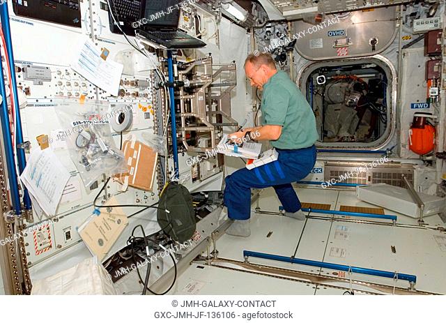 European Space Agency astronaut Hans Schlegel, STS-122 mission specialist, continues work aimed toward readying the agency's new Columbus laboratory for duty...