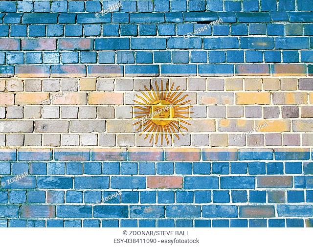 Argentina flag on a brick wall