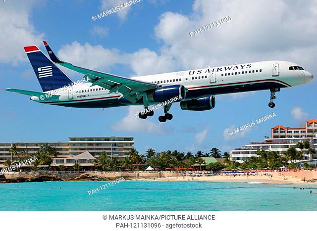 St. Maarten – 17. February 2014: US Airways Boeing 757-200 at Princess Juliana International (SXM) on St. Maarten. | usage worldwide. - Sint Maarten/