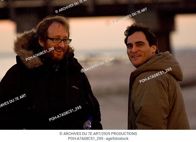Director James Gray with Joaquin Phoenix on the set  Two Lovers  Year: 2008 - USA. It is forbidden to reproduce the photograph out of context of the promotion...
