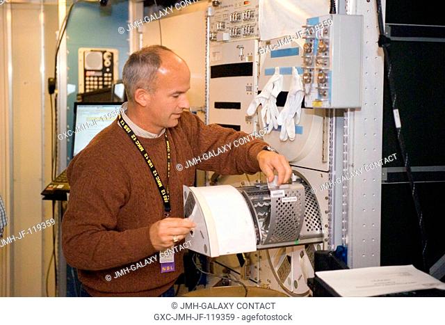 Astronaut Jeffrey N. Williams, Expedition 13 NASA space station science officer and flight engineer, participates in a training session in an International...