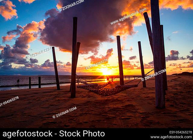 Dramatic sunset on the empty beach, Hjerting, Jutland, Denmark. Hjerting is a district of Esbjerg in southwest Jutland, Denmark