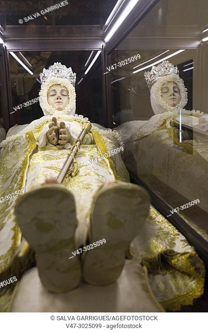 Sculpture of the Virgin of the Assumption in a glass coffin in the Casa Orduña de Guadalest Museum. this representation is taken to the processions in Holy Week...