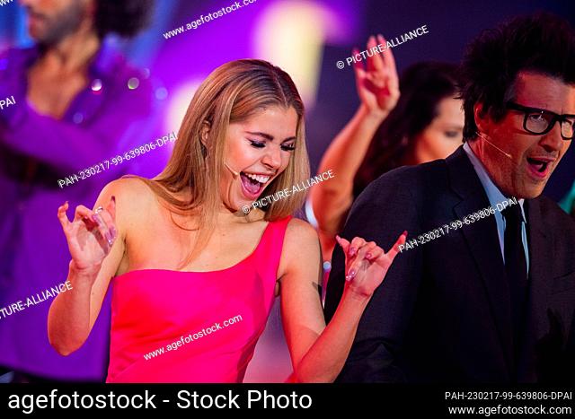 17 February 2023, North Rhine-Westphalia, Cologne: Victoria Swarovski, host, and Daniel Hartwich, host, are on the dance floor during the get-to-know-you show...