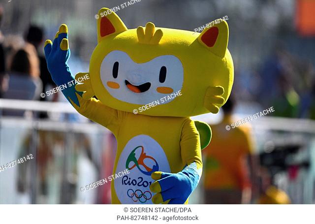 Olympic mascot Vinicius greets arriving spectators prior to today's races of the Rowing events of the Rio 2016 Olympic Games at Lagoa Stadium in Rio de Janeiro