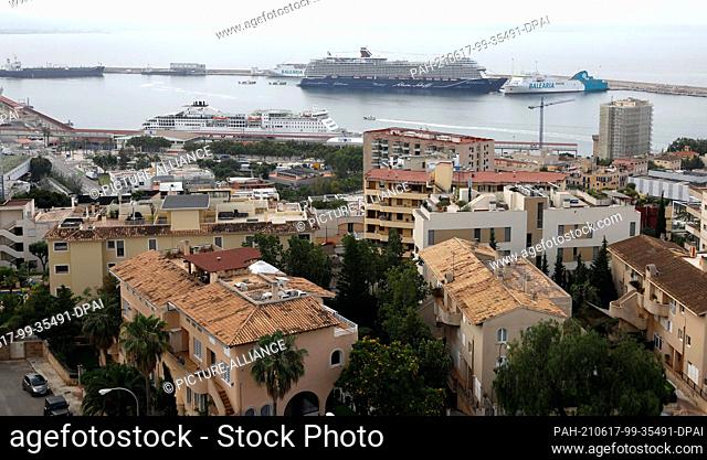 17 June 2021, Spain, Palma: The ""Mein Schiff 2"" docks in the port of Palma. The cruiser is the first passenger ship to dock on the Balearic island this year