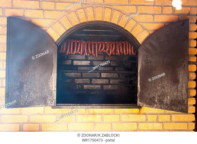Traditional food. Smoked sausuages in smokehouse