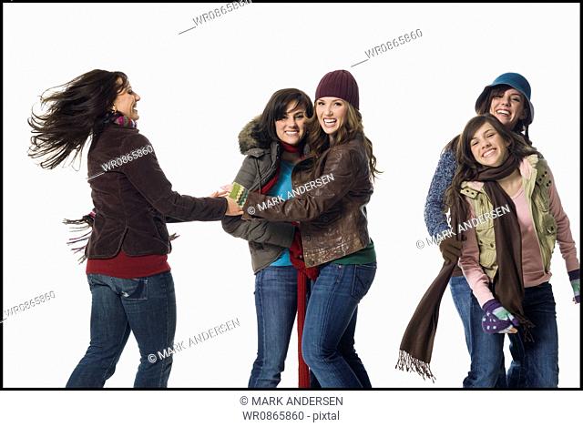 Five women in winter coats