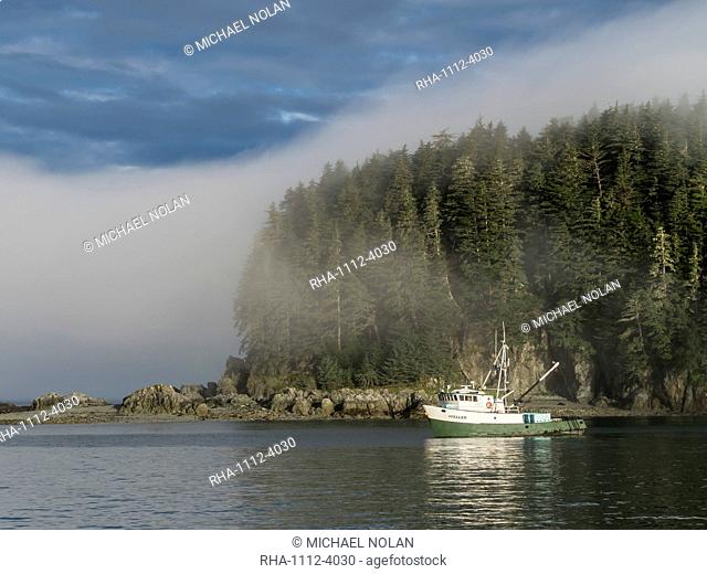 The fishing boat Steller anchored in the fog at George Island, Cross Sound, Southeast Alaska, United States of America