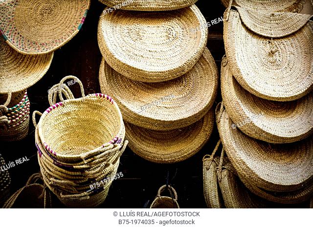 Wicker baskets of craftsmen in a street market in Fez, Morocco, Africa