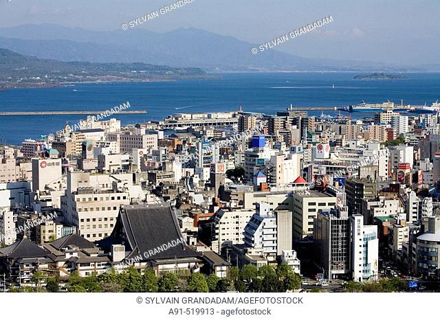 Overview on city of Kagoshima and volcano Sakurajima at back  Island of Kyushu  Japan