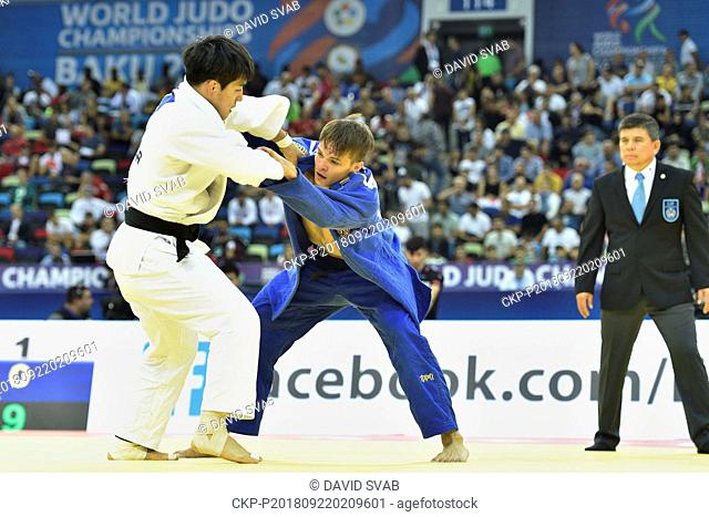 Czech judoka Jakub Jecminek (in blue) in action against An Chang-rim from South Korea during 2nd round match of men's 73kg class in World Judo Championships at...