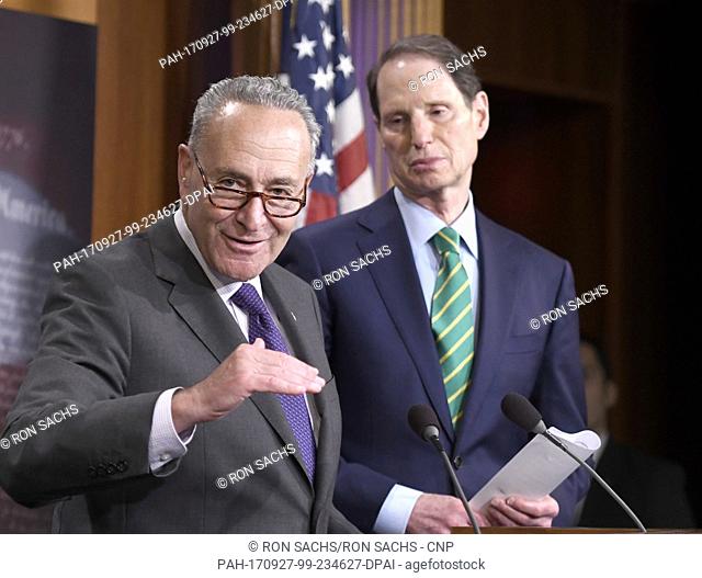 United States Senate Minority Leader Chuck Schumer (Democrat of New York) and US Senator Ron Wyden (Democrat of Oregon), the ranking member of the US Senate...