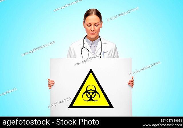 female doctor with biohazard sign over blue