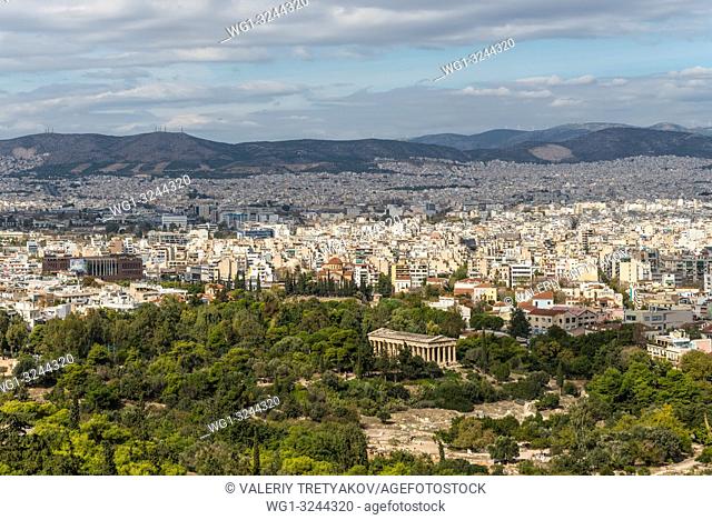 Panorama of Athens, Greece, from the Acropolis, an ancient citadel located on a rocky outcrop above the city and famous landmark in Athens, Greece