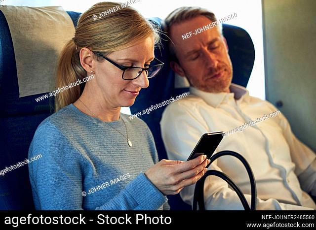 Man and woman in train