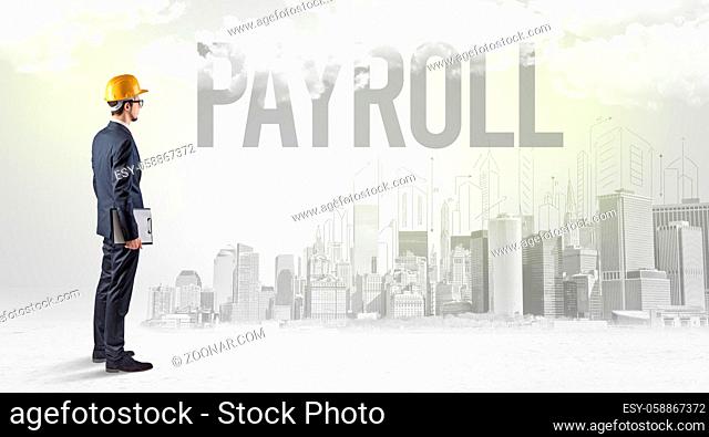 Young businessman with hard hat and PAYROLL inscription, new business opportunity concept