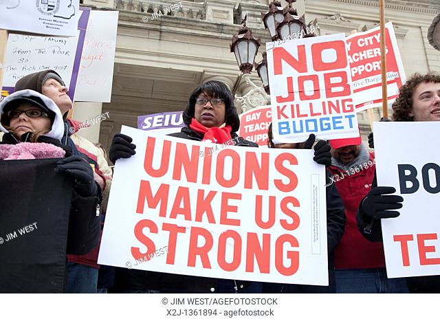 Lansing, Michigan - Workers rally at the Michigan state capitol in support of public employees in Wisconsin who are fighting to retain the right to collective...