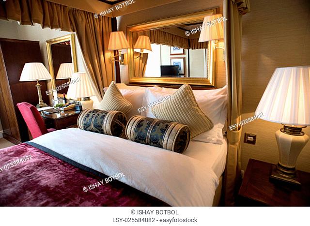 Interior of a classic style bedroom in hotel