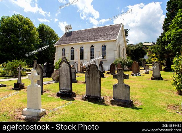 Russell, New Zealand - February 18, 2015: Small church and graveyard in the town of Russell