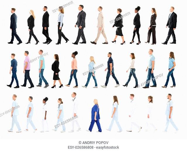Collage Of People From Different Occupations Walking In Line Against White Background