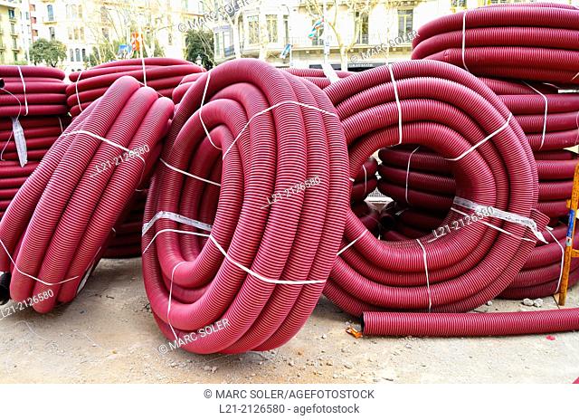 Red plastic tubing for construction