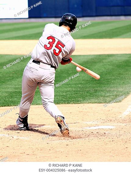 Baseball batter swinging